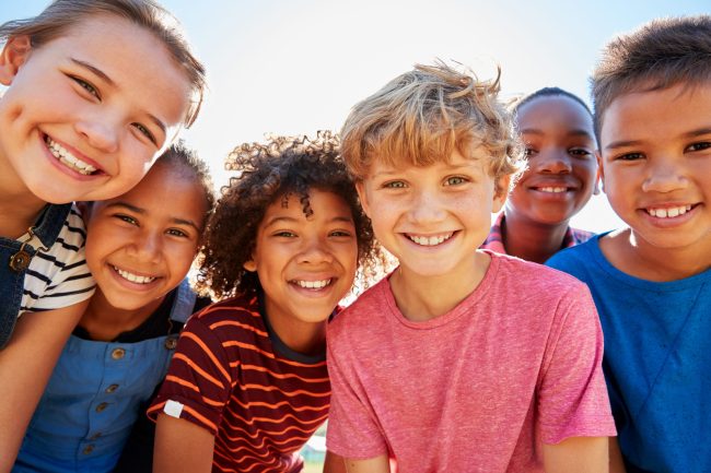 Close,Up,Of,Pre-teen,Friends,In,A,Park,Smiling,To family dentistry taylorsville ut Veneers cosmetic dentistry dental horizon dental dentist in taylorsville utah Dr. Joshua Frandsen dds